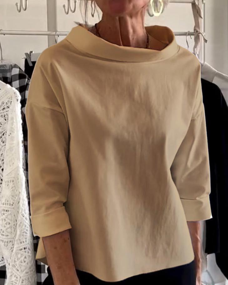 Elegantní dámský top s vysokým límcem