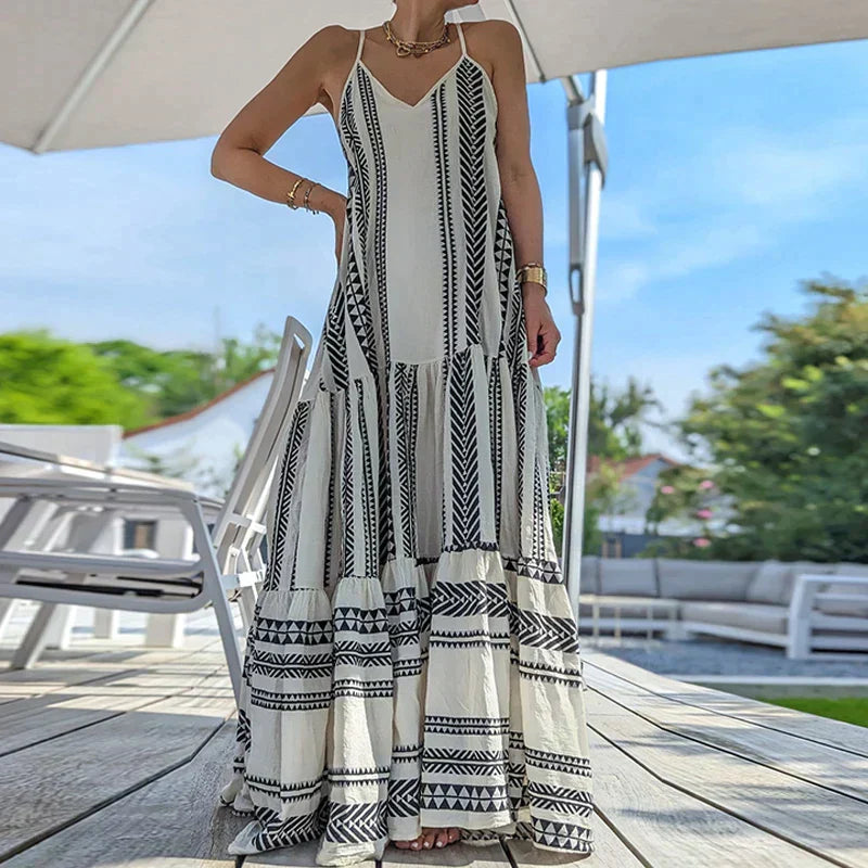 Debbie - Elegantní šaty bez rukávů s volánky a ležérním potiskem