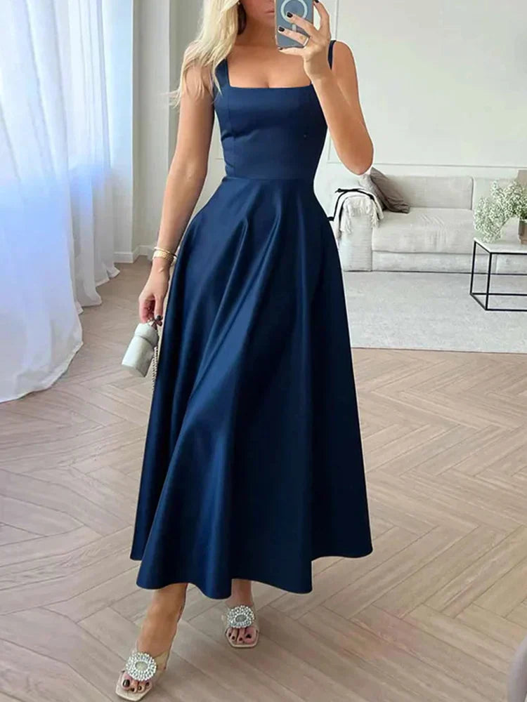 Midi večerní šaty na ramínka s širokou elegantní sukní