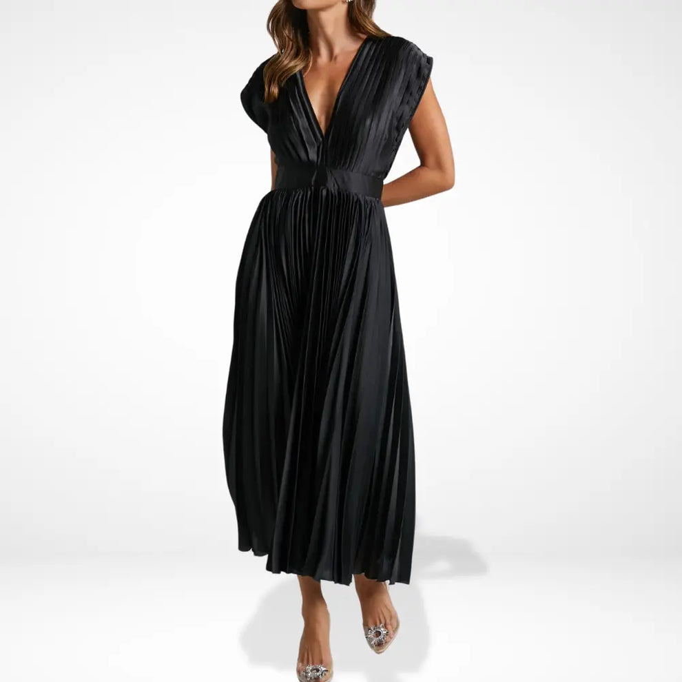 Dlouhé plisované šaty s hlubokým výstřihem a elegantním stylem