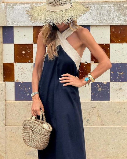 Elegantní šaty s výstřihem do půli lýtek a módním křížovým límcem