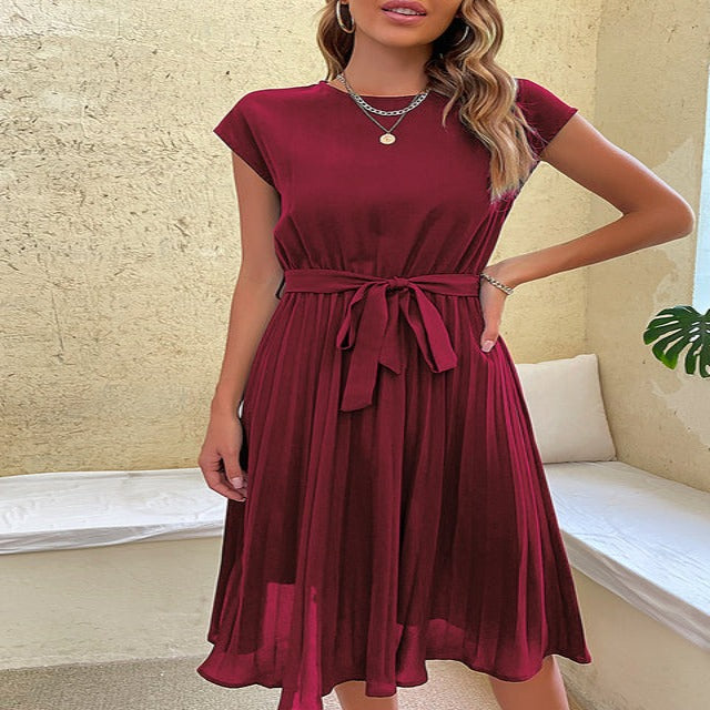 Plisované letní šaty s květinovým potiskem a vzdušnou elegancí