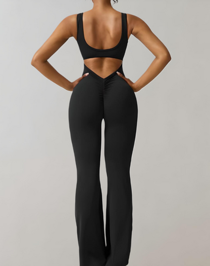 Clémence - Bodycon overal s výstřihem na ramínka a kalhotami do zvonu