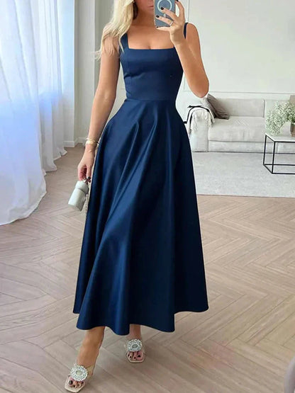Midi večerní šaty na ramínka s širokou elegantní sukní