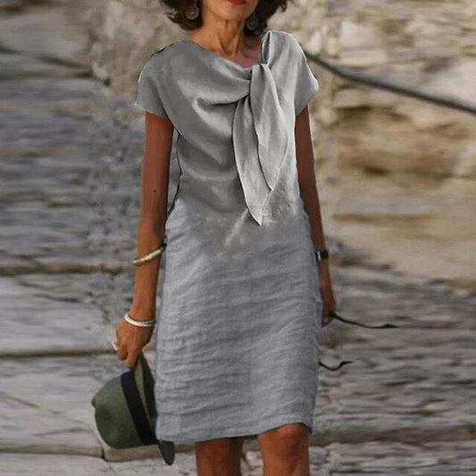 LD Ležérní a elegantní midi šaty s mašlí v designu