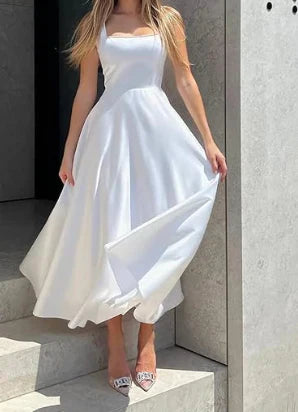 Midi večerní šaty na ramínka s širokou elegantní sukní