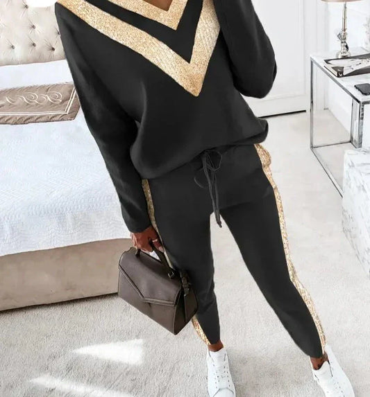Heidi Fashion - Černý dámský joggingový oblek se zlatou barvou
