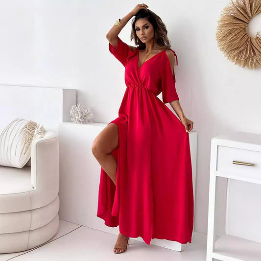 Elegantní dlouhé šaty s hlubokým výstřihem do V a stylovými tříčtvrtečními rukávy
